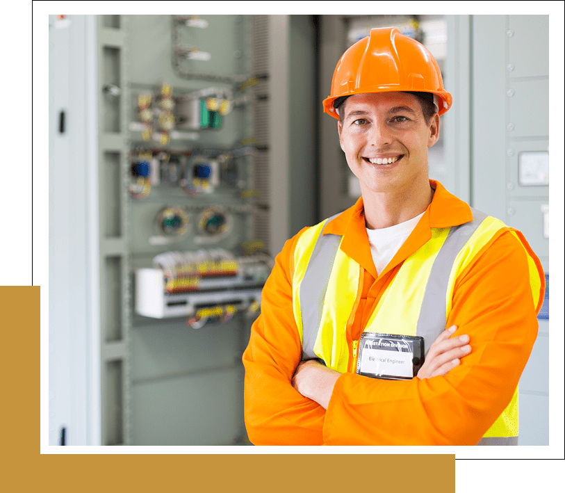 Smiling construction worker in safety gear.
